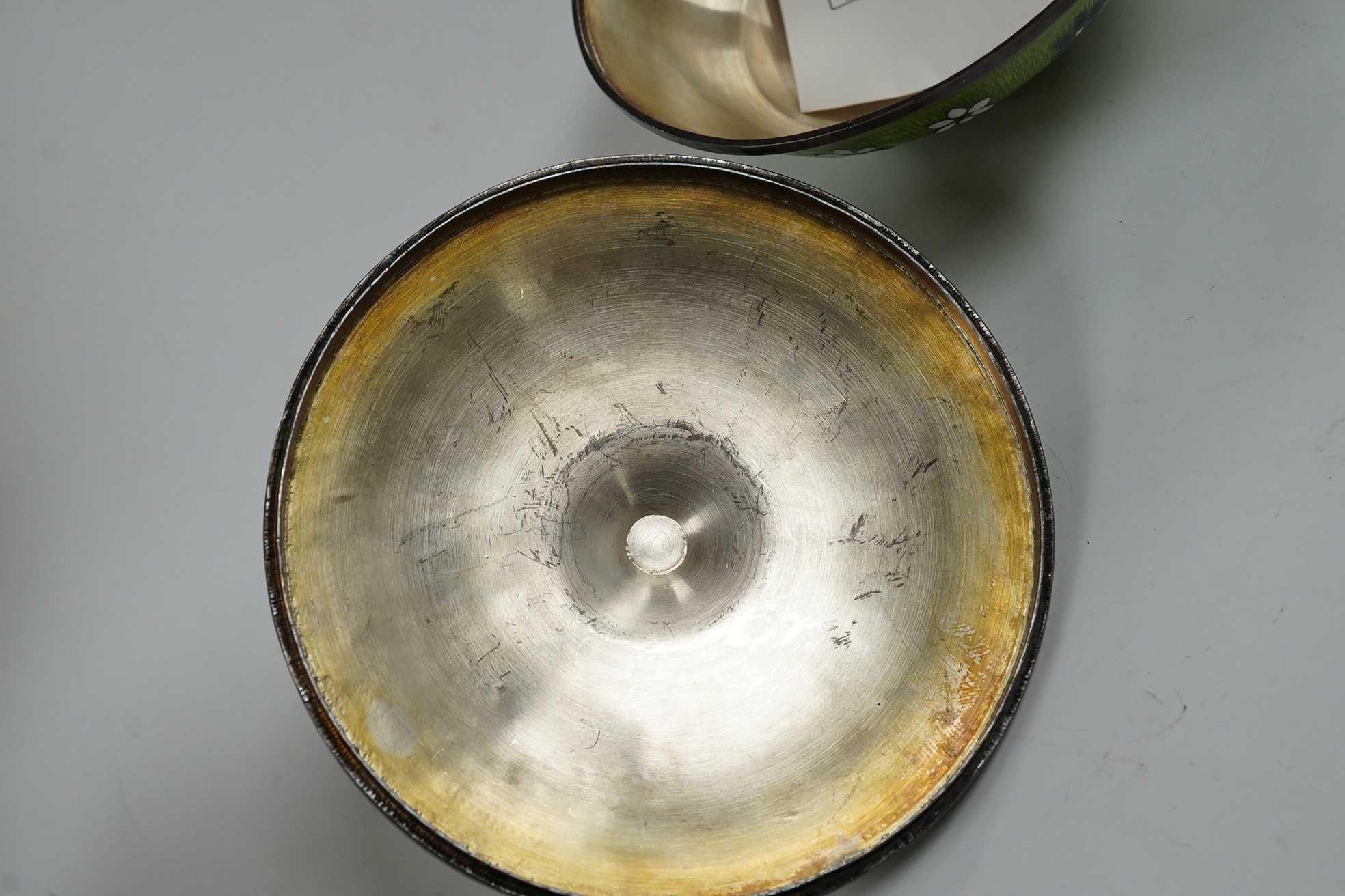A Korean white metal and enamelled circular pot and cover, diameter 11cm, gross weight 7.6oz. Condition - fair to good